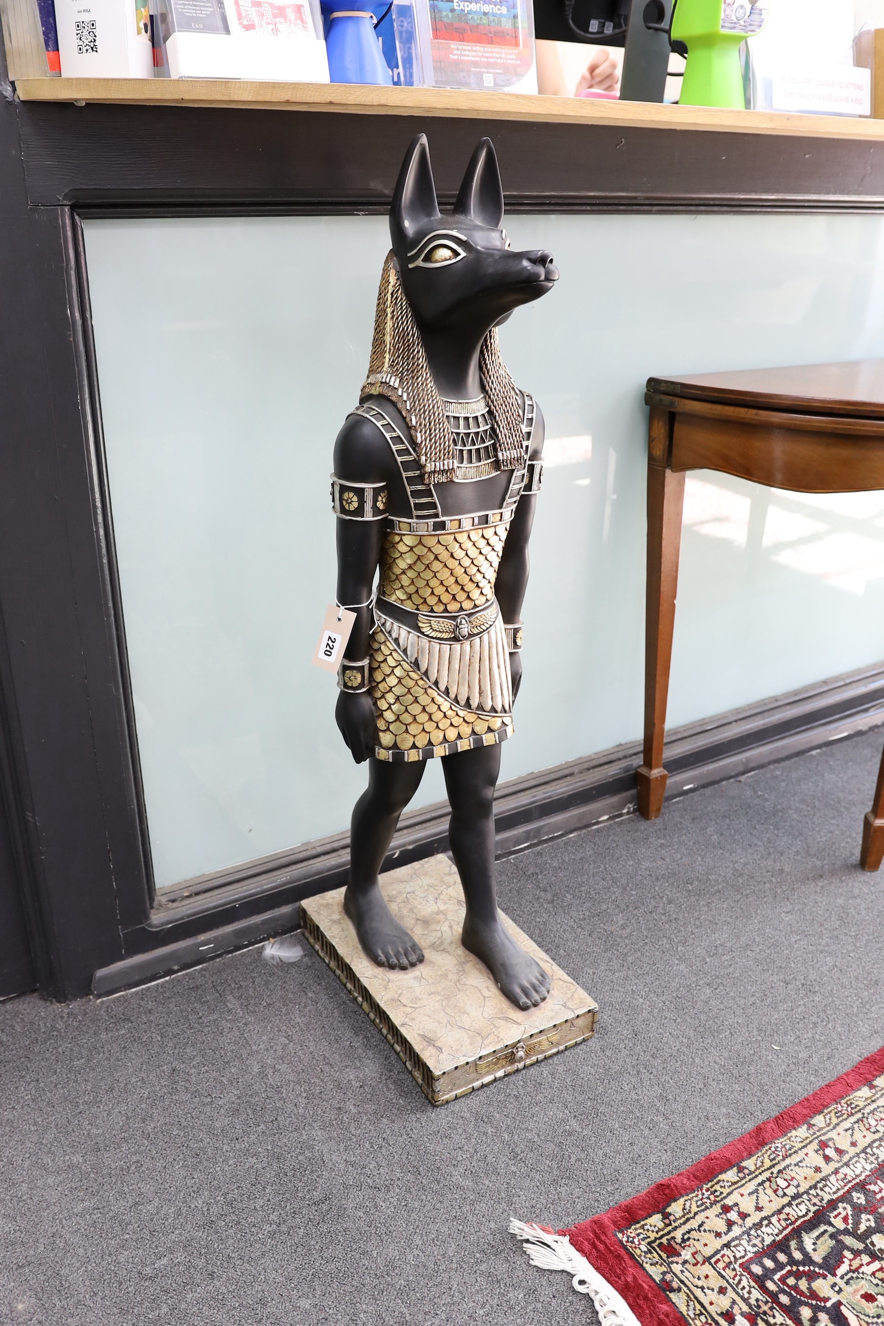 A pair of composition Dogs of Anubis, height 104cm